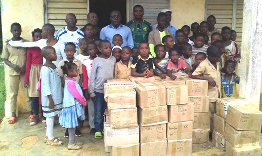 Community with boxes of books.