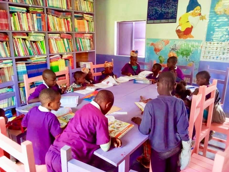 Children reading books.